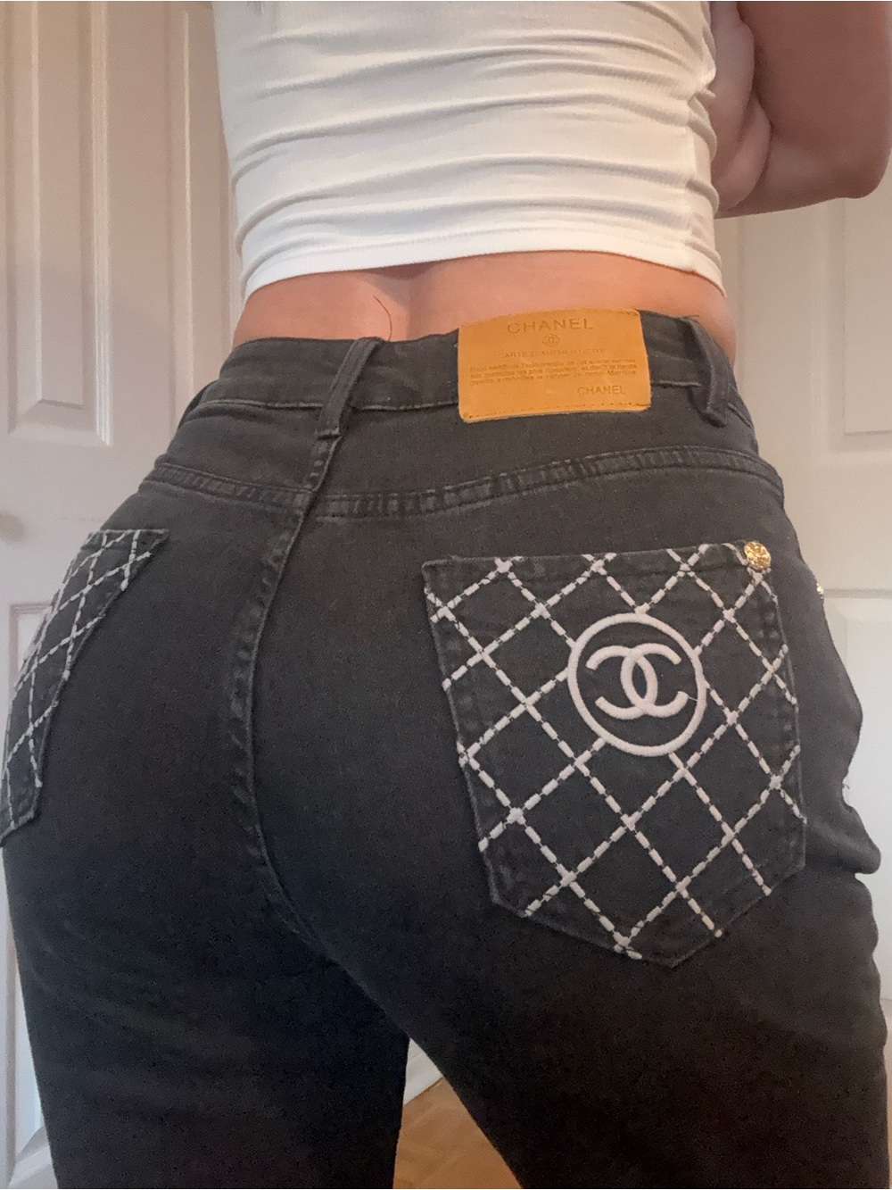 CHANEL Black High-Rise Jeans with Quilted Logo Pockets